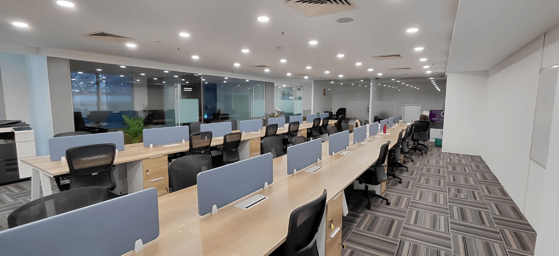 Workstations with glass partitions